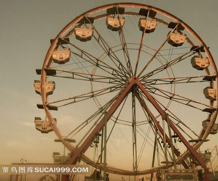 黄昏下旋转的摩天轮优美图片