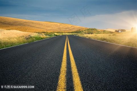 黄昏下的美丽道路景色高清图片