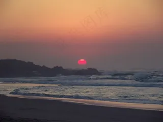 黎明日出海滩图片