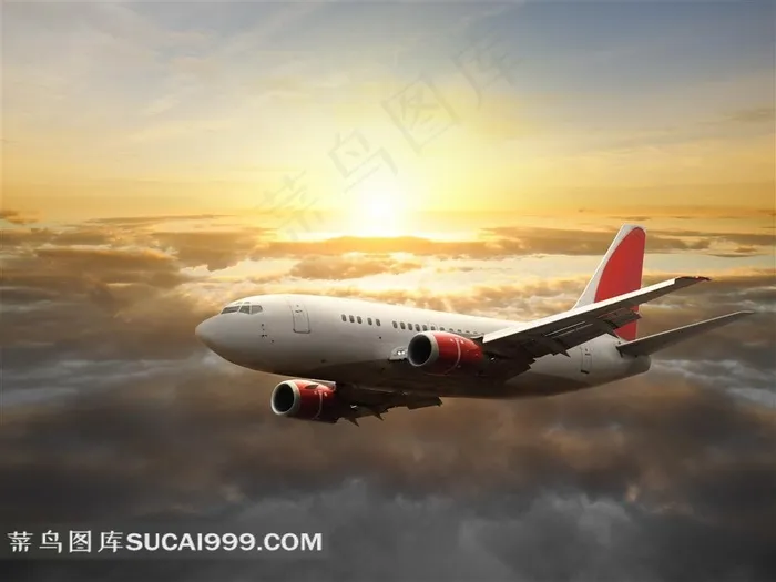 晨光中飞行的飞机高清摄影图片