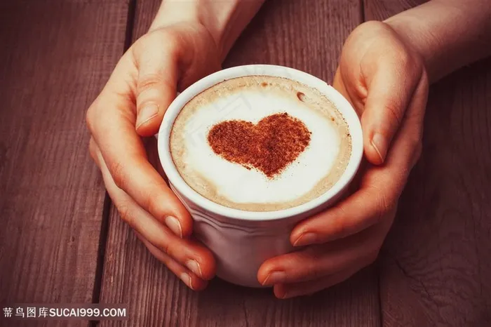 手捧咖啡图片