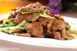 葱爆牛柳中华美食摄影图