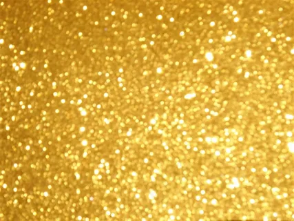 金色发光粒子背景高清图片