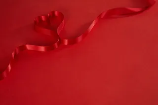 三八妇女节主题背景红色丝带