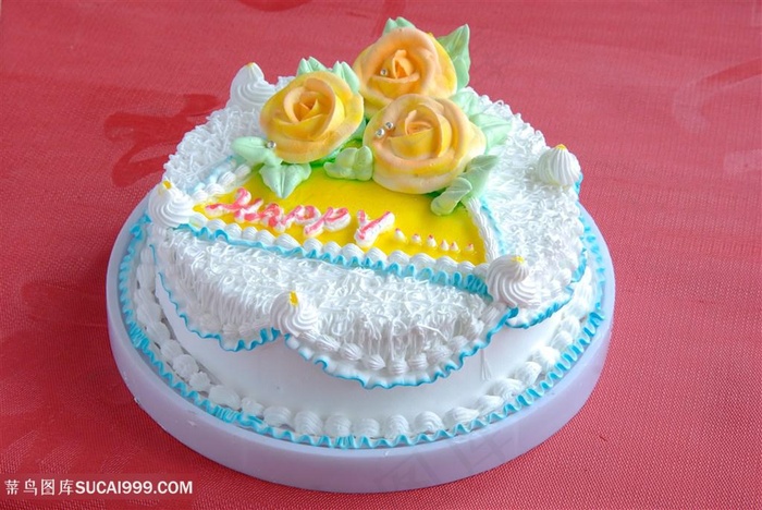 花朵白色奶油快乐蛋糕图片