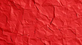 红色褶皱纸张纹理背景