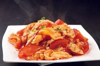 西红柿炒鸡蛋美食摄影图片