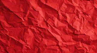 红色褶皱纸张纹理背景