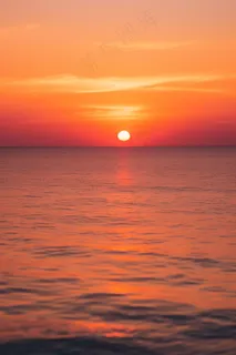 海洋海边日出日落夕阳摄影图