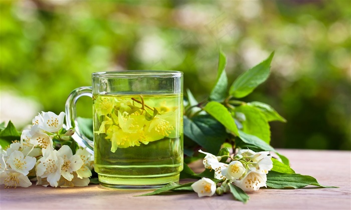 茶叶茶和花朵高清摄影图