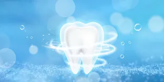 蓝色白色光效全国爱牙日展板背景