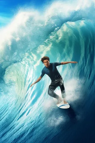 冲浪少年蓝色水花图