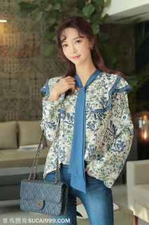 背着包包的韩国美女朴秀妍摄影图片