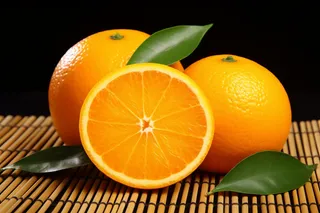 摆放的切片橙子水果摄影图