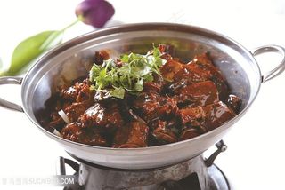 中华美食干锅兔肉摄影图