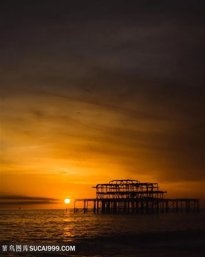 海上钻井平台日出风景图片