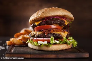 双层肉块西红柿果蔬美味汉堡图片美食西餐图片