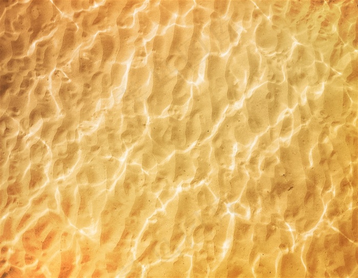 水波纹金沙俯视图炫彩背景图片