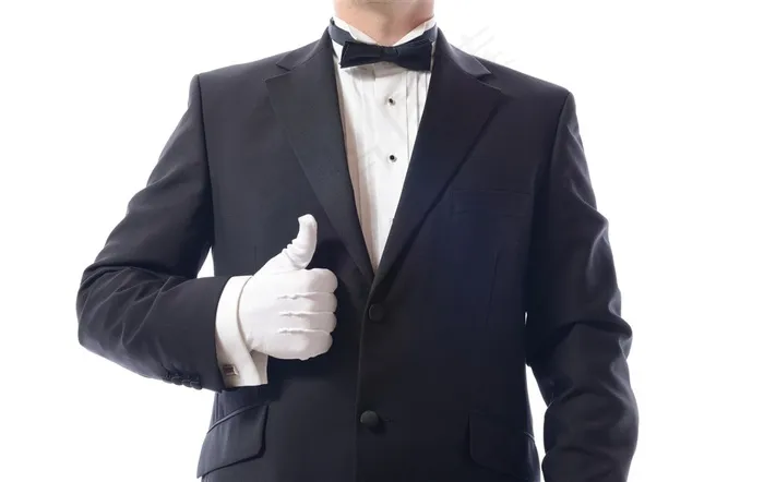 穿西装伸出大拇指的男士高清图片