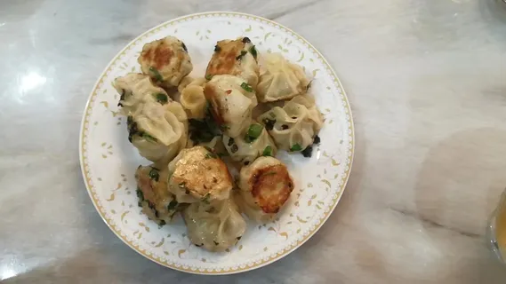 网红小吃拇指生煎实拍