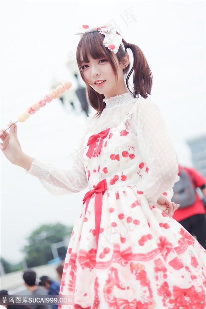 高清吃糖葫芦的卡哇伊小美女图片