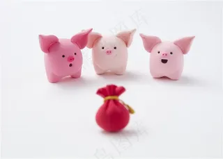 欢乐的粉色小猪送钱袋高清图片
