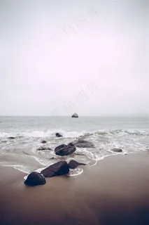 辽阔大海沙滩上的礁石摄影高清图片 辽阔大海沙滩上的礁石摄影高清图片