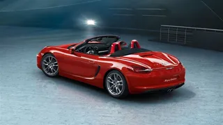 炫丽红色保时捷敞篷跑车摄影图