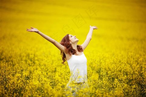 油菜花花海与美女写真高清摄影图片