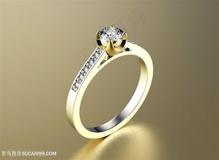 倒映着光芒的镶钻戒指高清摄影