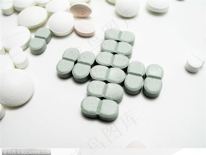 医学药品-摆成十字架的药丸