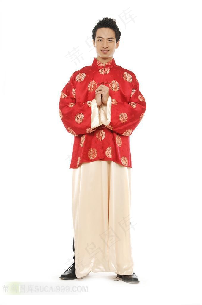 身穿唐装道喜的男人手势摄影高清图片