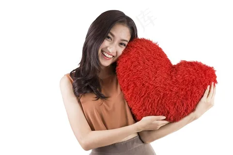 白底抠图专用长发女性开心依靠爱心枕头素材图片 白底抠图专用长发女性开心依靠爱心枕头素材图片