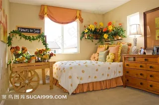 儿童房里的鲜花与大床摄影