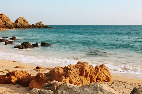 海边海浪沙滩礁石摄影图