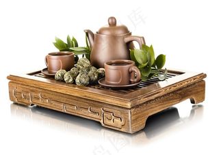 茶壶边上的茶水饮料素材图