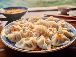 饺子美食蘸料摄影图