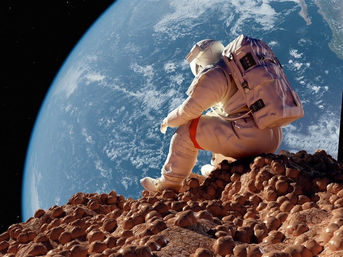 坐在星球上的宇航员