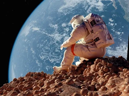 坐在星球上的宇航员