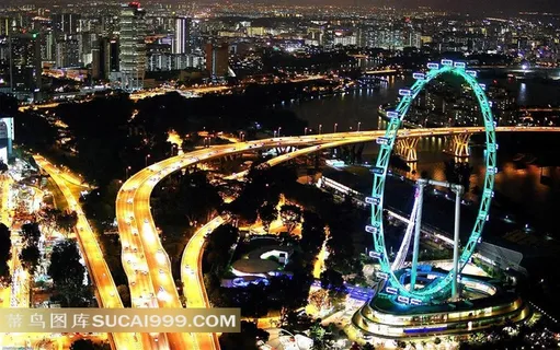 新加坡摩天观景轮车水马龙的公路城市夜景素材 新加坡摩天观景轮车水马龙的公路城市夜景素材