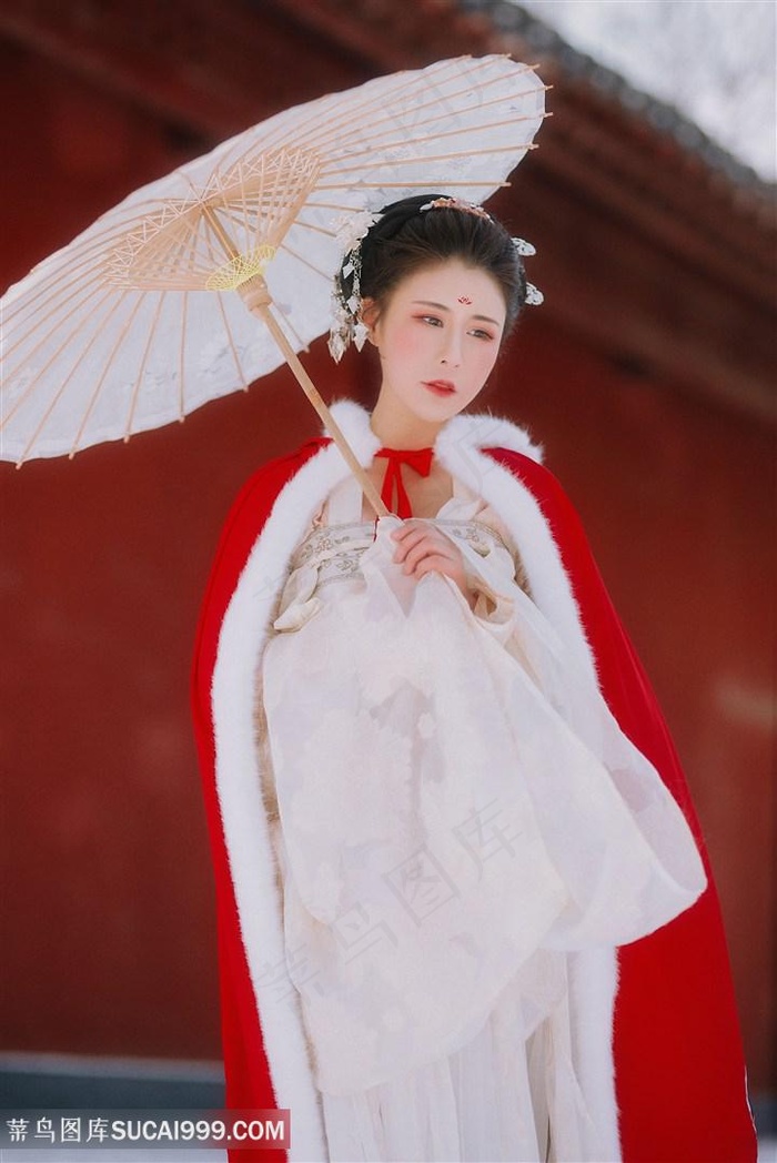 城墙下打着纸伞的古装美女图片