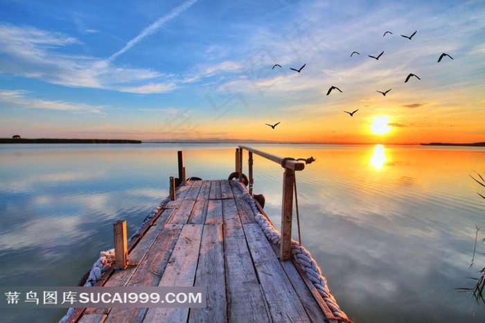 唯美的夕阳海上码头美景高清摄影图片