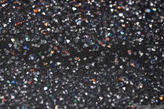 银色闪光小钻反光镭射玻璃背景