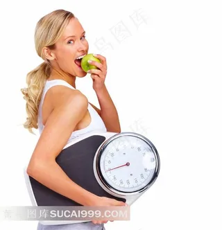 减肥瘦身题材吃苹果的美女和体重计
