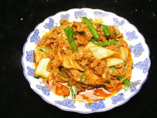 牛肉炒辣白菜五花肉炒辣白菜鱿鱼炒辣白菜