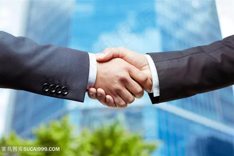 高楼大厦下握手手势图片 高楼大厦下握手手势图片