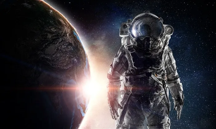 宇宙中的星球和宇航员高清图片