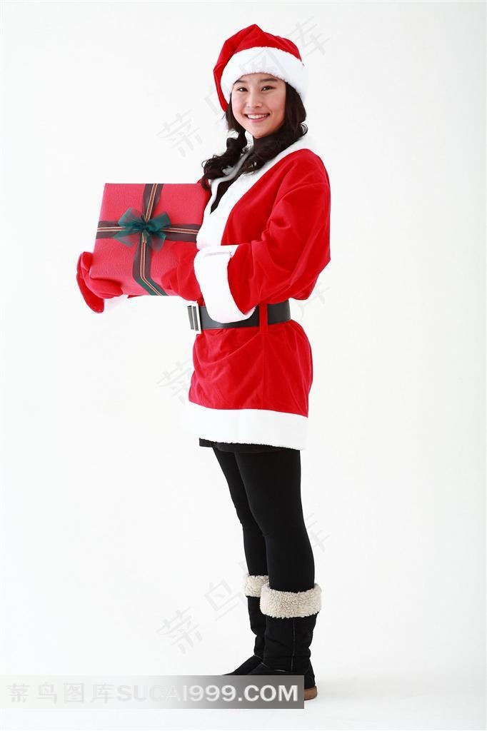 侧站抱礼物的圣诞宝贝