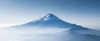 雪山山脉云层云端意境冰山，自然风景冬天蓝天白云摄影图