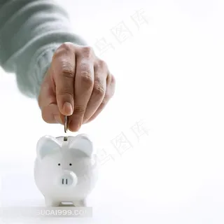 手放小猪存钱罐高清素材